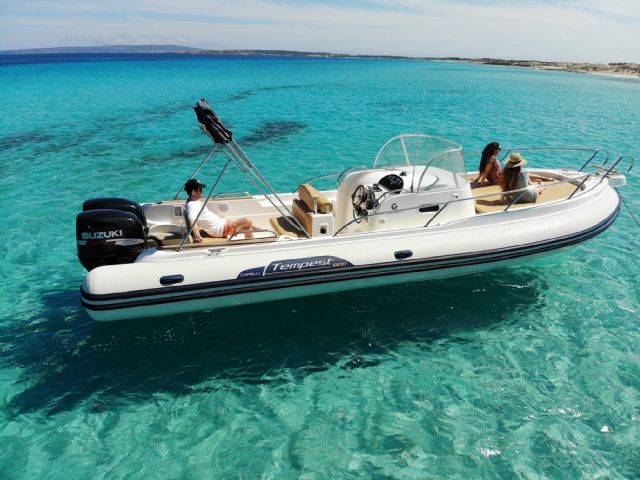 Group of friends enjoying Ibiza boat rental