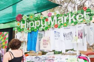 Colorful stalls at Las Dalias market with handmade crafts and clothes