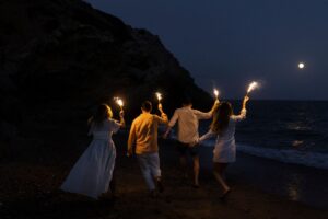People enjoying the traditional midnight swim during San Juan Ibiza