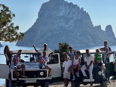 Land tour group of friends on jeep adventure trail in Ibiza