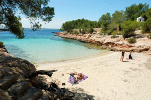 Crystal-clear water at Cala Gracioneta beach in Sant Antoni Ibiza
