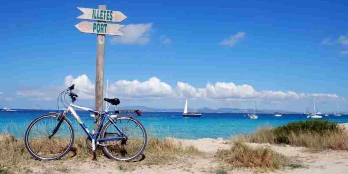 Tourist renting a bike to explore Formentera beaches near Ses Illetes