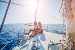 Couple watching sunset in Talamanca, Ibiza – romantic travel moment