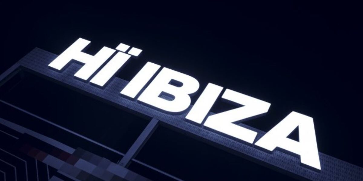 Hï Ibiza club entrance lit up at night in Playa d’en Bossa