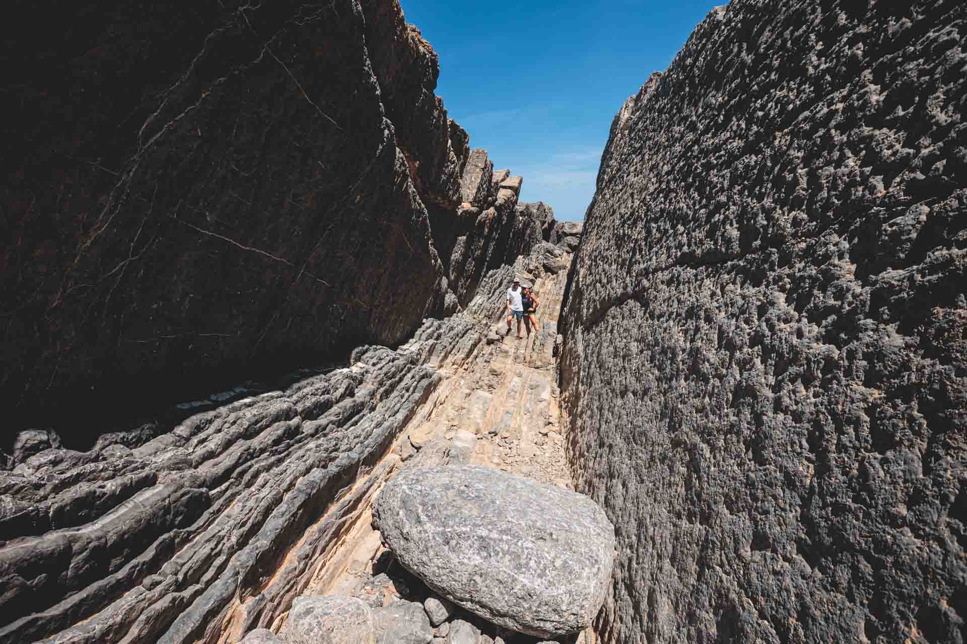 Close-up of layered rock cliffs—some of Ibiza’s oldest visible geology