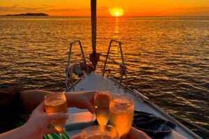Tourists enjoying a sunset cruise off Ibiza’s west coast