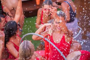 Women enjoying a safe night out at a beach club in Ibiza